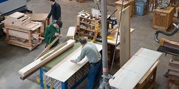 Wood Zoon team of skilled artisans crafting premium wooden furniture seo